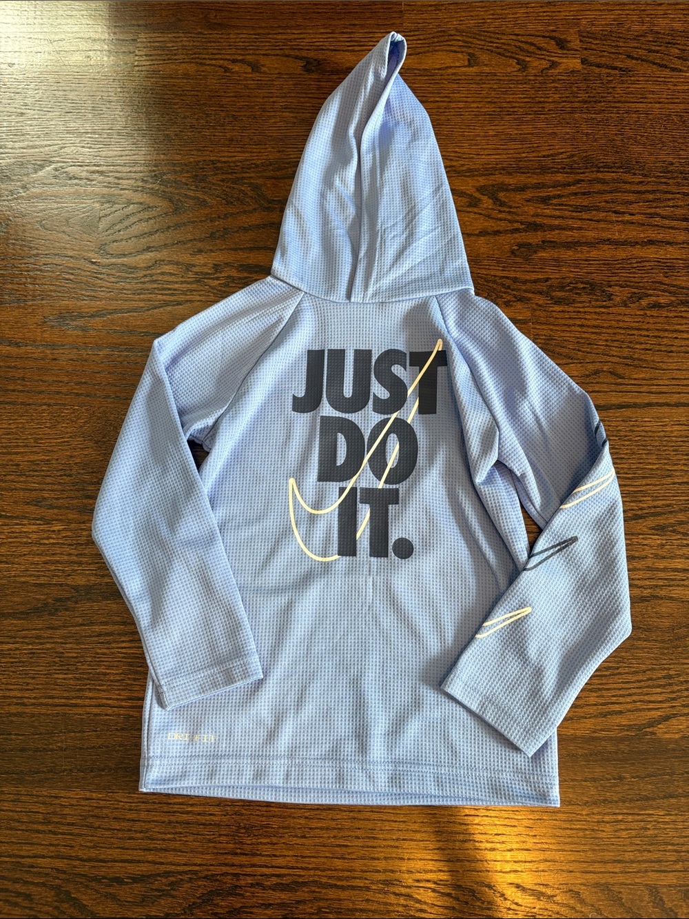 Nike Kids Light Blue Hooded Performance Top with 'JUST DO IT.' Back Graphic